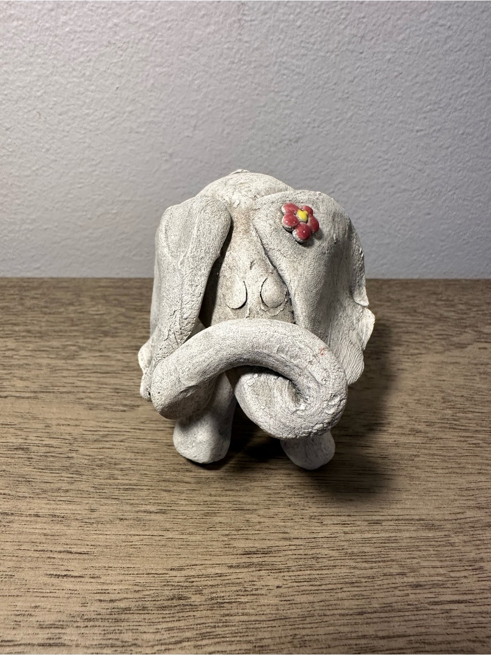 Handcrafted Elephant Figurine with Pink Flower Accent